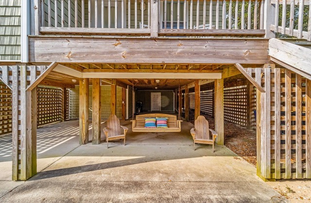 Charming home with wraparound balcony, central AC, full kitchen, & W/D