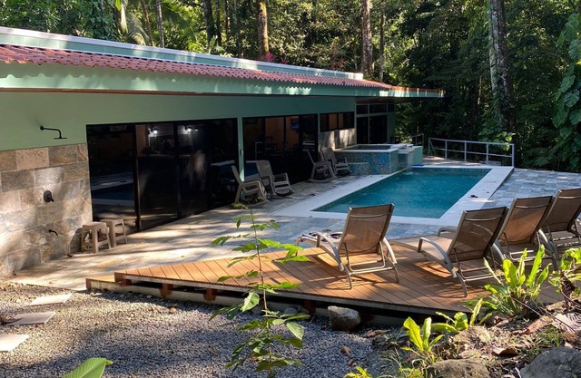 Charming riverfront cabin nestled in the tropical jungle