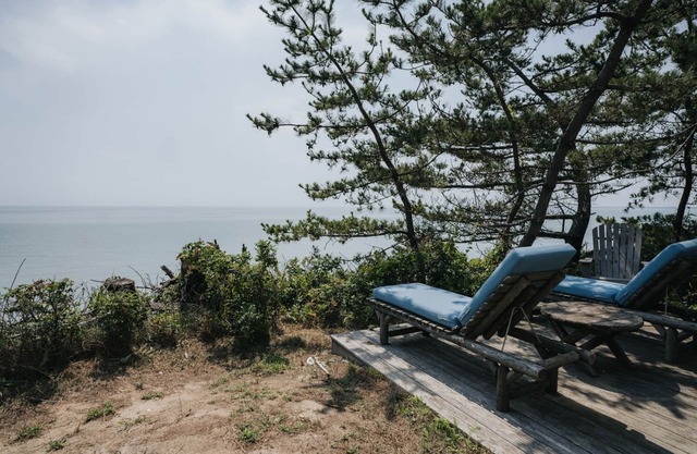 Encantadora cabaña frente al mar aislada con acceso privado a la bahía Capacidad para 4