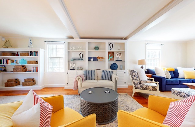 Classic Cape Cod home near beaches with yard, patio & outdoor fireplace