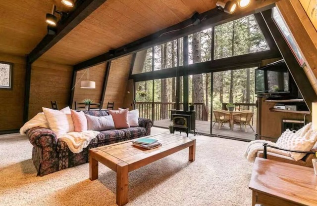 Classic Tahoe a-frame cabin forest view floor2ceiling window. Near Northstar