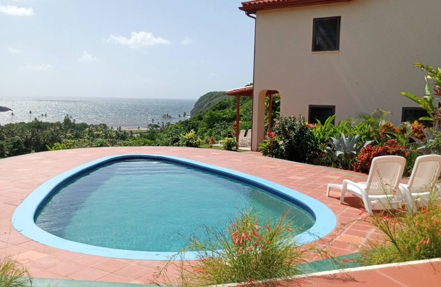 Fond Bay Suites Hotel - Cliffside Oceanfront Exotic Gardens