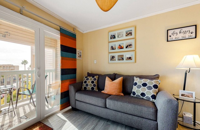 Condo steps from the beach w/private balcony & shared outdoor pool