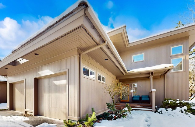 Conveniently located townhome with kitchen, kitchenette, balcony & fireplace