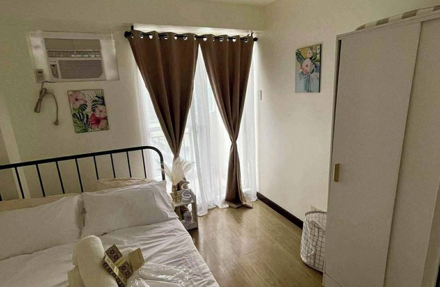 Cozy 1-bedroom condo in Infina Towers Cubao Quezon City with AC