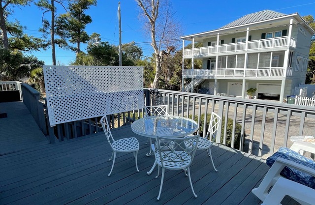 Cozy beach home with inviting, sunny pool & charming private deck/pets welcome