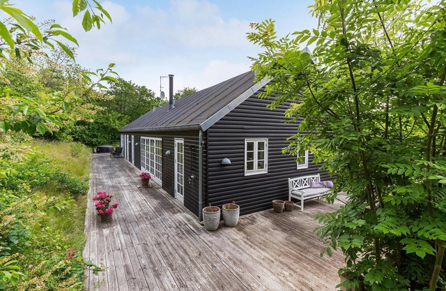Acogedora casa en Dronningmølle con.