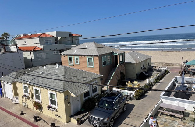 Cozy Ocean View Beach Cottage, Pasos para el Océano, Large EnclosePatio -1BR- Capacidad 5