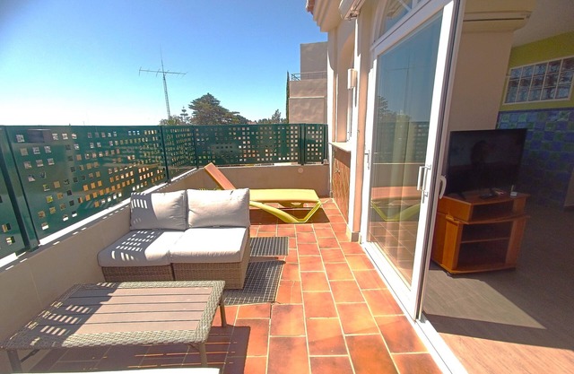 Flamencos del Cerrado D-3 Apartamento con terraza y vista parcial al mar
