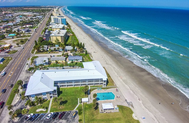 Dog-friendly condo in oceanfront complex with pool & direct beach access