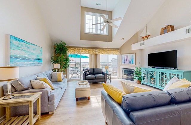 Dog-friendly home with water-view balconies, on-site pool, washer/dryer, AC
