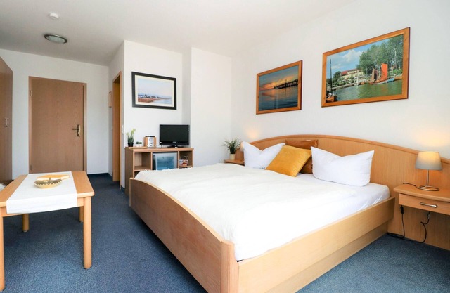 Double room with balcony directly at the harbor of Wustrow
