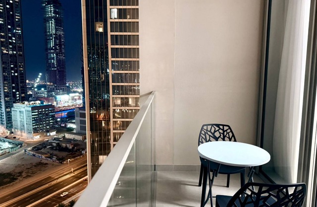 Elegant Downtown Escape 1BR w/ Balcony, Pool & GYM