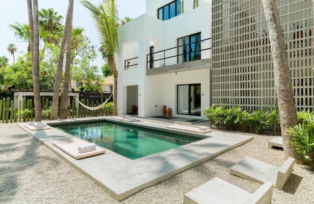 Elegant Hideaway with Rooftop, Local Accents & Live Music