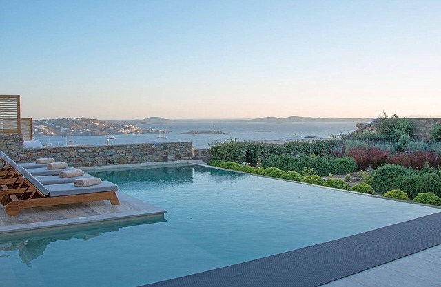 Endearing Mykonos Villa | Villa Riddle | 5 Bedrooms | Breathtaking Sea Views | Spacious Furnished Sun Terrace | Private Outdoor Pool | BBQ Facilities | Shaded Outdoor Dining Area | Private Gym | Agia Sofia, Tourlos Aside