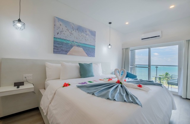 Enjoy a king bedroom and private bathroom with sunset or sunrise views