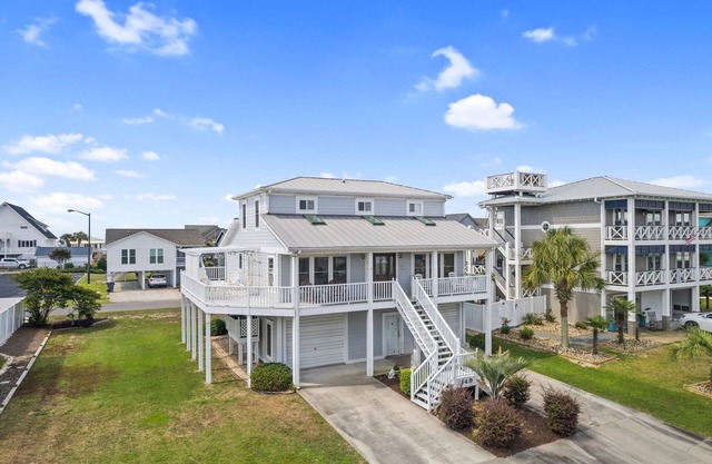 Enjoy comfort, convenience, and elegance during your stay at one of the most sought-after locations on Holden Beach!