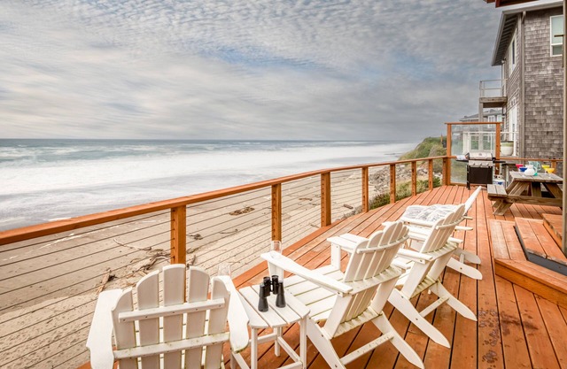 Enjoy the beach from this Ocean Front home with a Hot Tub and Large Deck