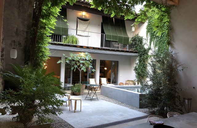 Exceptional residence and outbuilding with heated pool in the heart of town
