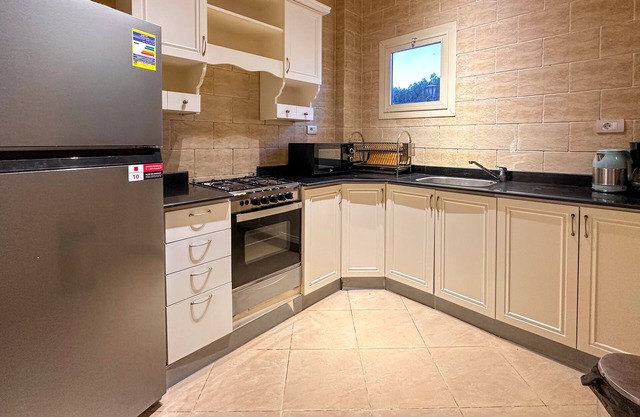 Exclusive apartment with private garden area and big swimming pool