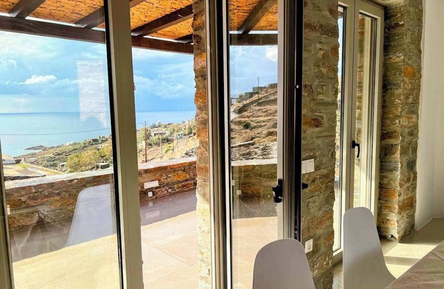 Experience Authentic Charm at Tzia Stone Apt with a Modern Twist and Sea Views