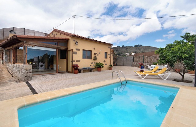 Casa de vacaciones Tinamar II con vistas a la montaña, piscina, Wi-Fi y jardín