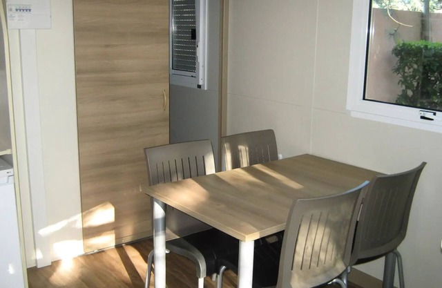 Flower Camping le Pilon d'Agel *** - Chalet Némo Confort 3 rooms 4 people Air-conditioned