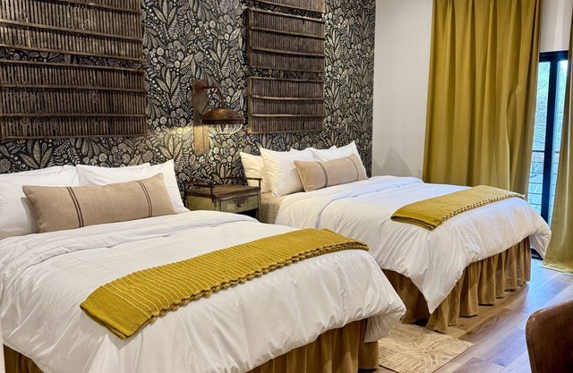 Gaines Ranch on the Square | The Lazy Spur Suite | 2 Queen Beds | Wimberley
