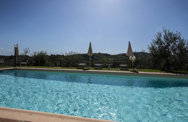 Gina, apartamento con vistas a las colinas de San Gimignano