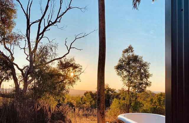Golden Hour Views: Sunset Cabin with Outdoor Bath