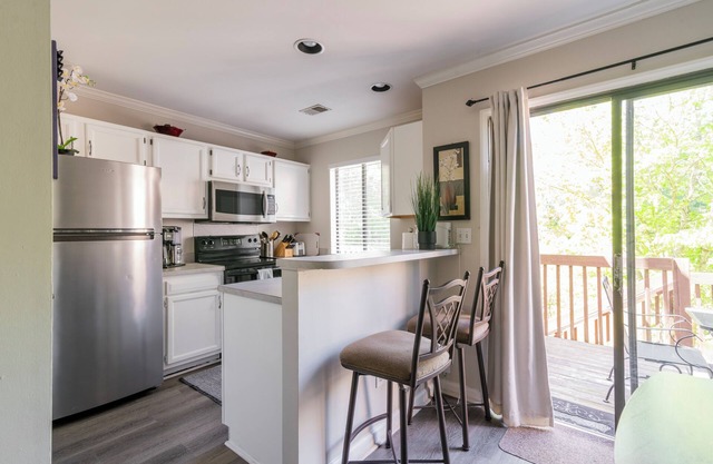 Precioso 2bd 1. 5ba Townhome en campo de golf. 2 camas Queen y un sofá cama.