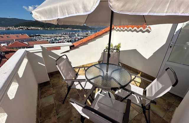 Gran ático dúplex centro Muros. Terraza con vistas