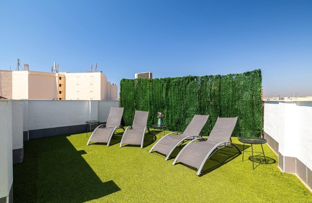 H2M Suites 1 dormitorio con terraza en azotea