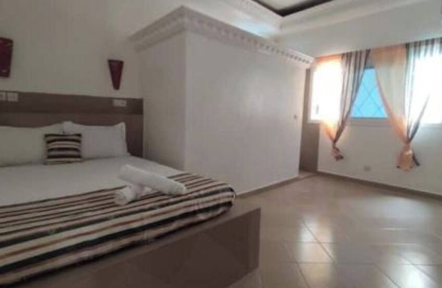 Happy Bien être Accommodation 2 bedrooms, living room with 2 bathrooms