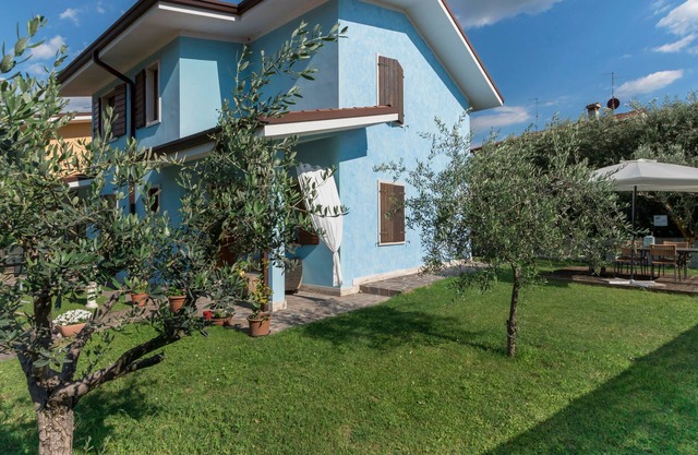 Apartamento vacacional "Bella Cora" con jardín y azotea privada