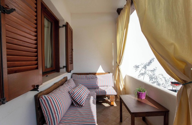 Apartamento vacacional "Casa Antonella" con jardín, balcón y aire acondicionado