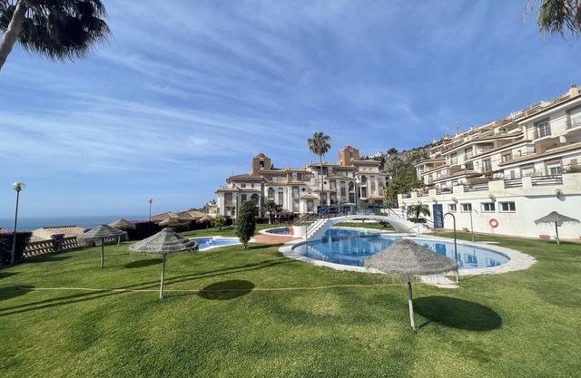 Apartamento vacacional "Piso Jardines De Adnania B" cerca de la playa con piscina compartida y Wi-Fi