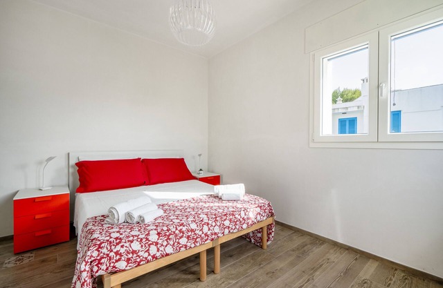 Apartamento vacacional "Gufo Di Mare - Rosso" con vistas al mar, terraza privada y Wi-Fi