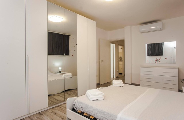 Apartamento vacacional "Villa Farfalle" con Wi-Fi, aire acondicionado y jardín
