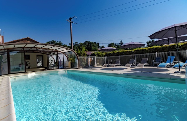 Casa de vacaciones 'Liz' con piscina compartida, Wi-Fi y aire acondicionado