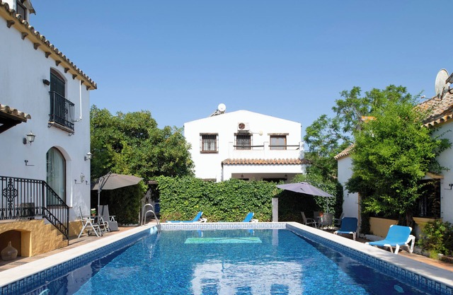 Casa de vacaciones 'Casa Rural La Higuera' con piscina compartida, Wi-Fi y aire acondicionado