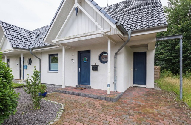 Casa de vacaciones 'Ferienhaus Nordmeer' con terraza privada, jardín privado y Wi-Fi