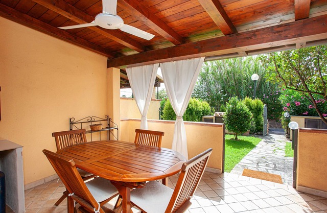 Casa de vacaciones 'La Casa Di Margaret' con terraza privada, jardín privado y aire acondicionado