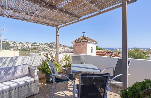 Casa de vacaciones 'La Casa Armoniosa' con vistas al mar, Wi-Fi y aire acondicionado