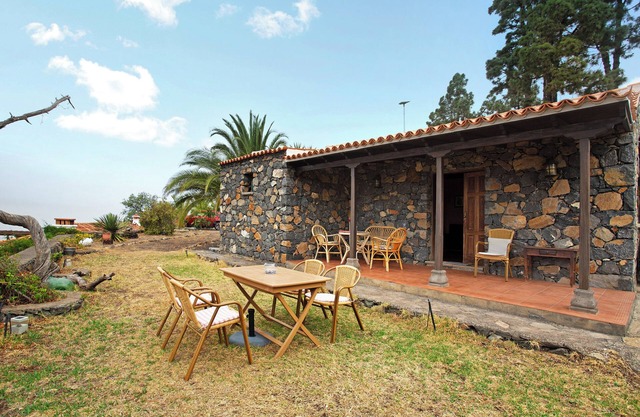 Casa de vacaciones 'La Roquina' con vistas al mar, Wi-Fi y aire acondicionado