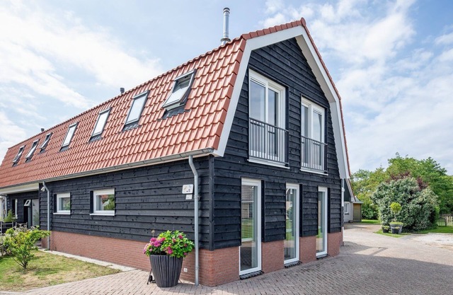 Holiday home near forest with wellness garden