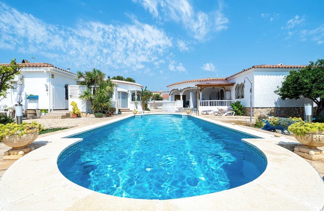 Casa de vacaciones "Palmera" con piscina compartida y Wi-Fi