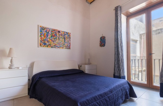 Casa de vacaciones 'Vacanza Piano Piano' con terraza privada, balcón y aire acondicionado