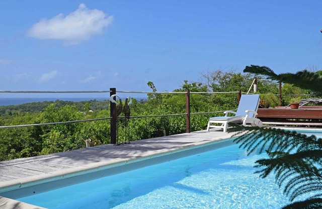 Homerez - Villa moderna con piscina en Sainte-Anne 154 m² vista al mar