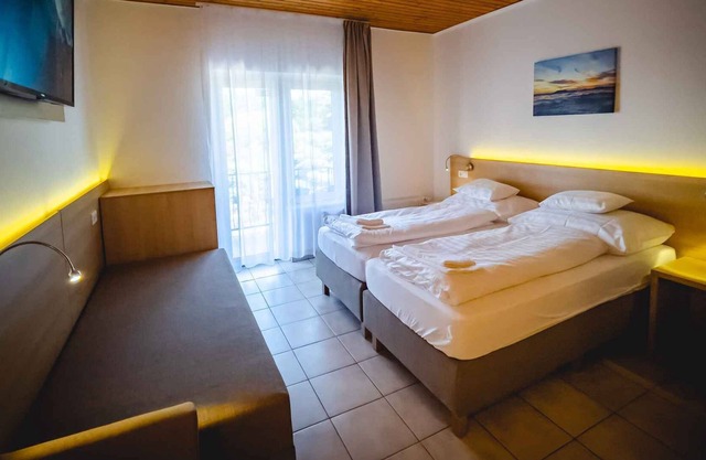 Apartamento vacacional en una pensión con panorama y desayuno